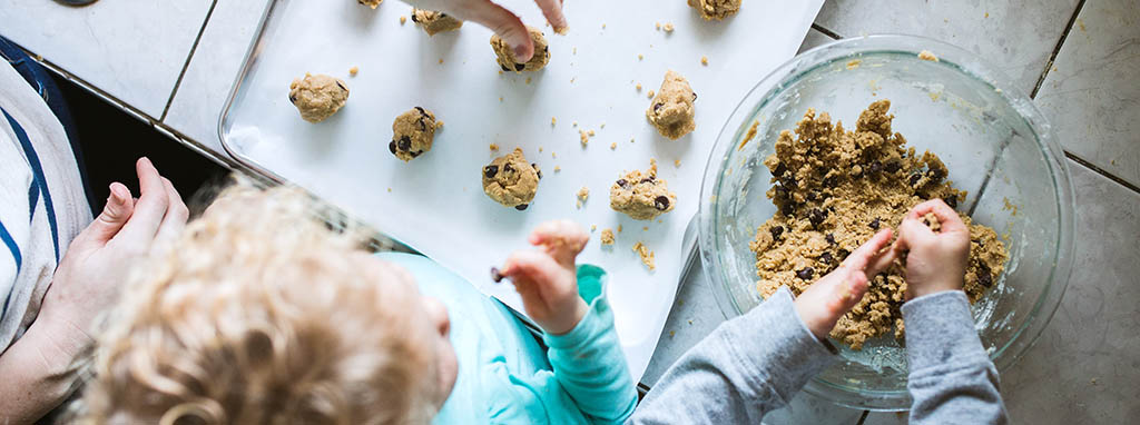 child baking cookies