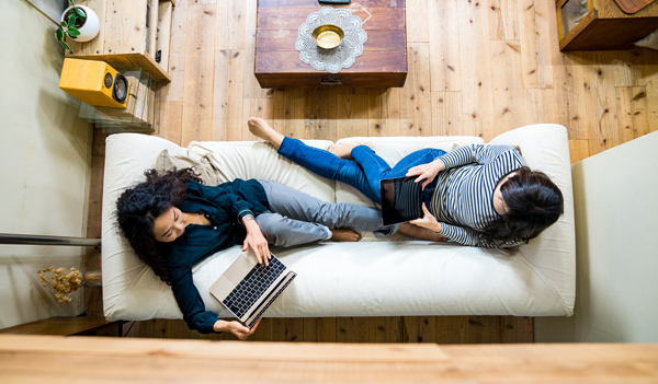 Two people on sofa