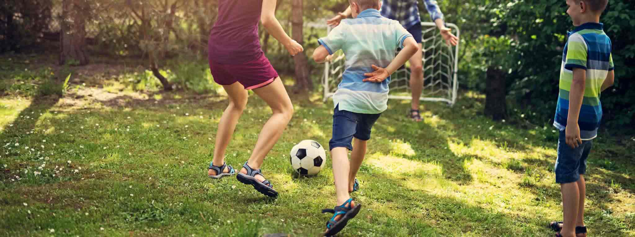 Family playing football