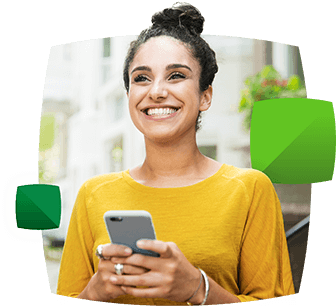 Woman smiling while holding a phone